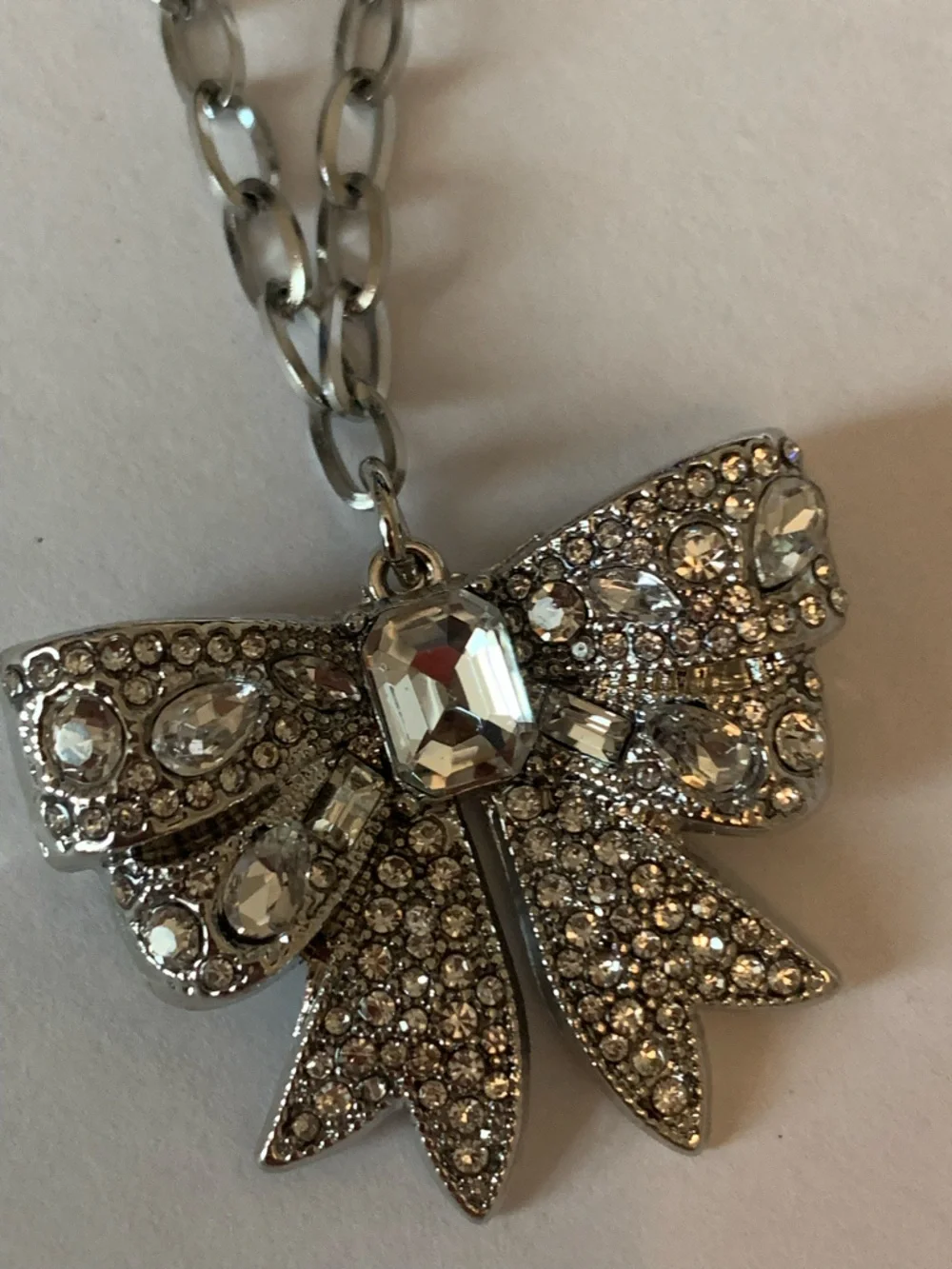 Silver Bow Pendant Necklace - Shiny Metallic - Picture 1 of 4